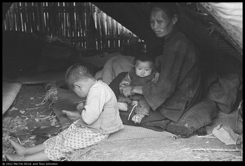 Women and children in temporary shelter, Shanghai, Rosholt Collection, Ro-n0385.