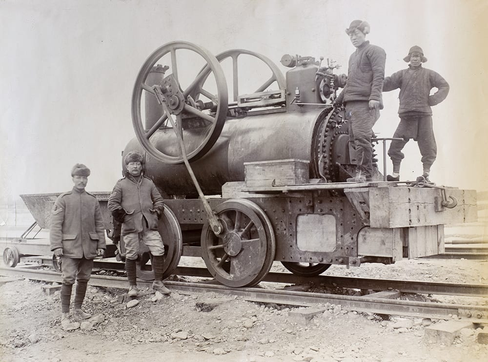This improvised locomotive was the product of the Royal Engineers No 4. Company of the Bengal Sappers and Miners, under Captain H.R. Stockley. The engine, named ‘Grasshopper’, had been cobbled together under the supervision of Sergeant A. Tinkham, who was engaged in the reconstruction of Boxer-destroyed railway tracks in and around Fengtai, Peking (Beijing) in 1900. HPC ref NA06-16: a photograph from an album (WO 28/302. China. Boxer Rebellion) in The National Archives. Crown copyright image reproduced by permission of The National Archives, London, England.