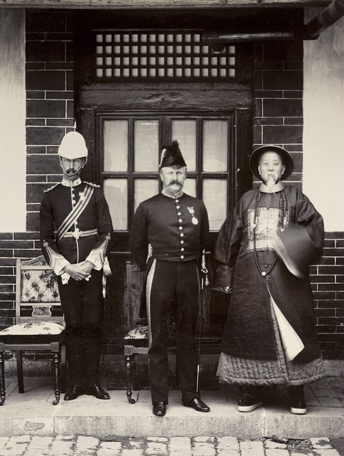 Left to right: Captain Barnes, Sir James Lockhart, and the Governor of Shandong, Tsi Nan Fu. From an album, CO 1069/432, CHINA 12. Shantung and Kiaochou: photographs of a tour in 1903. Image © The National Archives, London, England. Historical Photographs of China ref: NA07-047. See also NA07-050.