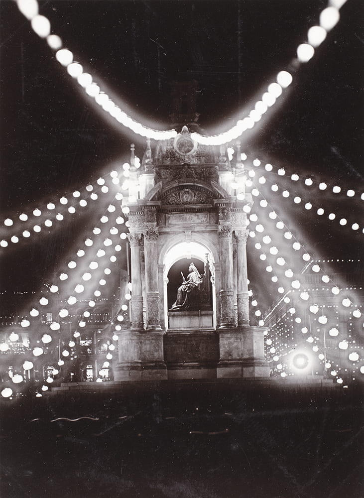 Queen Victoria’s statue, Hong Kong, lit up with lanterns for the coronation of King George V and Queen Mary, June 1911. Photograph by Afong Studio (Lai Fong). HPC ref: Bi-s184.