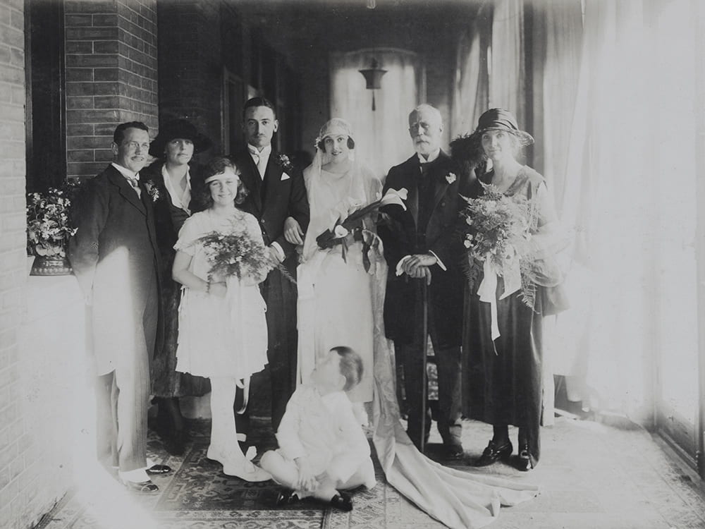 The wedding of Madeleine Hillier and Charles Todd at St Michael’s Roman Catholic Church, Beijing. To their left, Guy and Ella, to their right, Kathleen Watson and Captain Stileman, Best man; in front, Eileen Hutchins and David Brown. HPC ref: EH01-349.